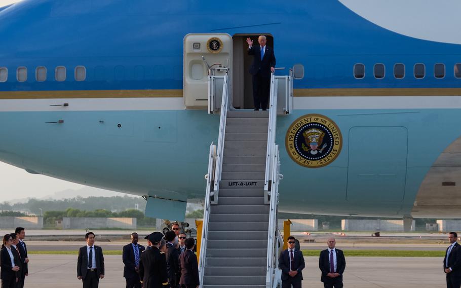 President Donald Trump exits Air Force One at Osan Air Base, South Korea, Saturday, June 29, 2019.