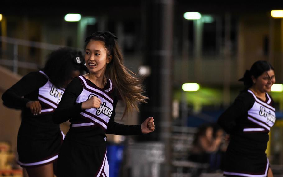 Zama American Middle-High School cheerleaders entertain the crowd during a matchup with the Matthew C. Perry Samurai at Camp Zama, Friday, Oct. 25, 2019. 