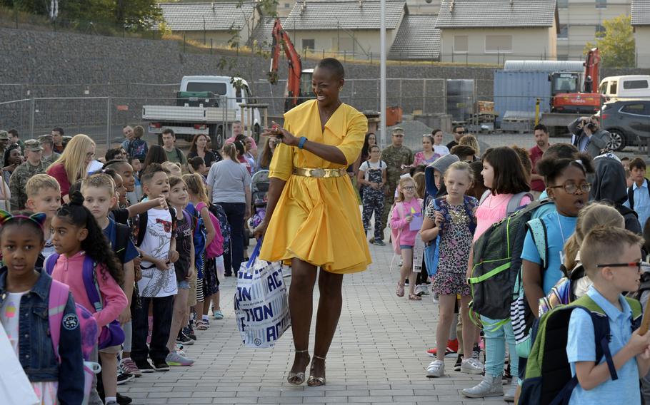 Teacher Watoma Taylor greets students on the first day of school at the new Vogelweh Elementary School, Monday, Aug. 26, 2019.  

