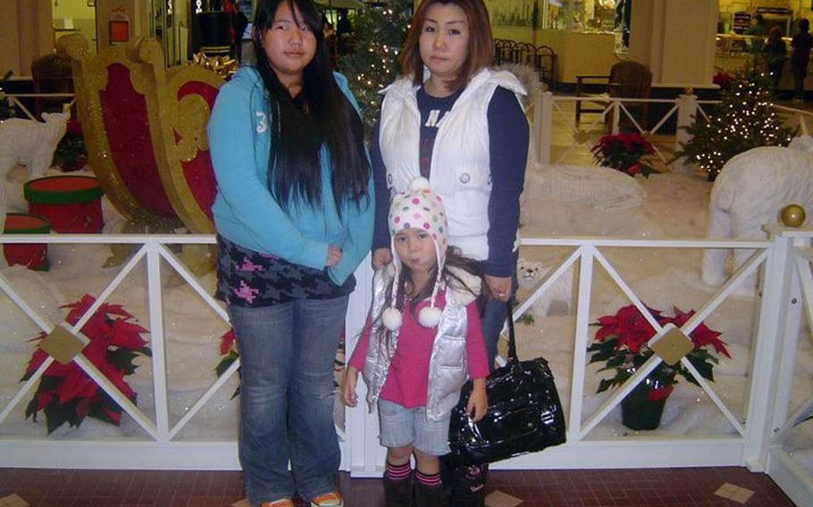 Yumiko Conway, right, and her daughter, Christina, pose in this undated photo. Conway is believed to have brought her daughter from California to Japan in 2012 during divorce proceedings, without the consent of the father, former sailor Donny Conway. The father has not seen or heard from them since. 