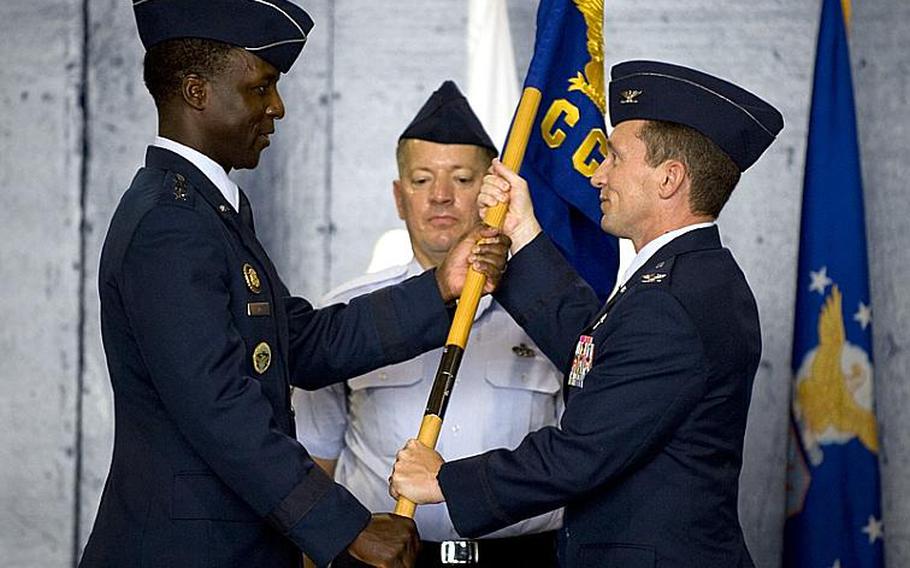U.S. Air Force Col. Michael Rothstein, right, accepts command of the 35th Fighter Wing from Lt. Gen. Edward A. Rice Jr., commander of U.S. Forces Japan and the 5th Air Force, during a ceremony at Misawa Air Base, Japan, on Tuesday.