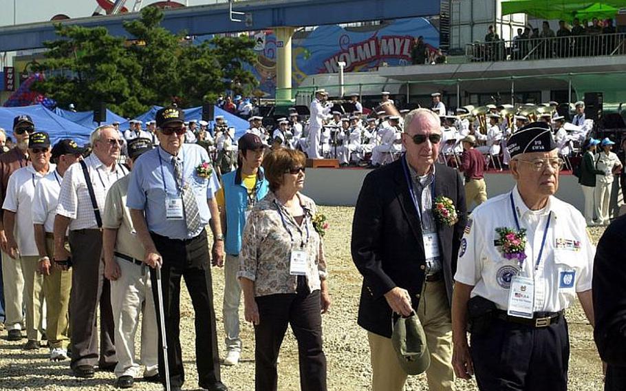 Korean War veterans file Wednesday into ceremonies marking the 60th anniversary of the Inchon Landing, a surprise attack that was a turning point in the Korean War. The event was held on Wolmi Island in South Korea, one of the places allied forces came ashore during the operation.