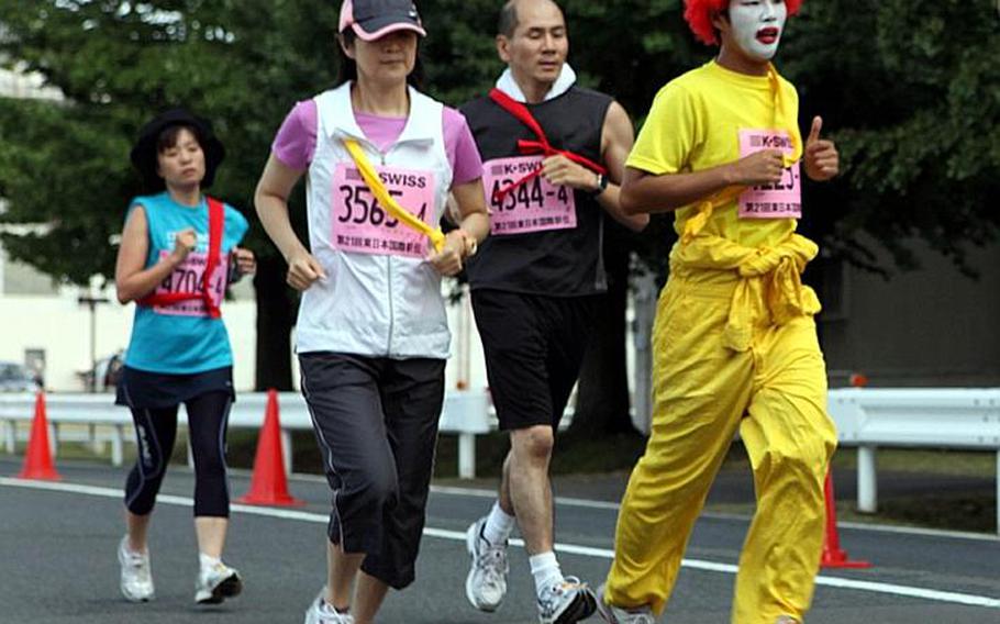 A variety of runners, some wearing costumes, could be seen at the 21st annual Ekiden relay race Sunday at Sagami General Depot.