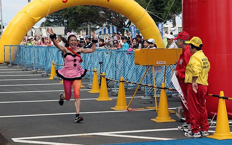 This costumed runner was one of many to celebrate at the finish line of the  21st annual Ekiden relay race Sunday at Sagami General Depot.