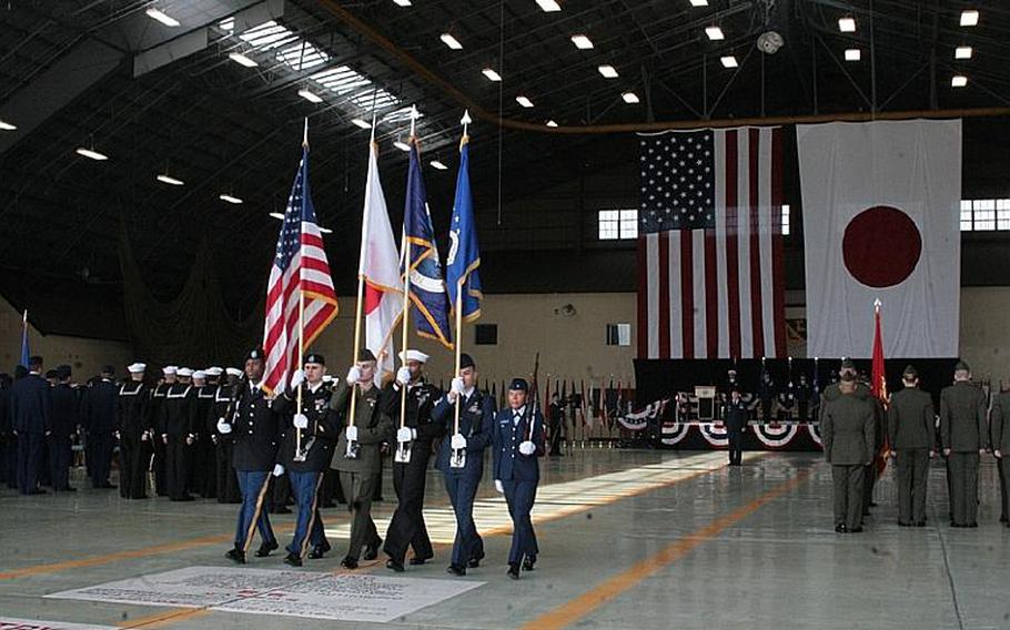Troops from all four services formed the color guard at the U.S. Forces change of command ceremony Monday at Yokota Air Base. Tracing its origins to the headquarters of Gen. Douglas MacArthur, USFJ oversees all 85,000 U.S. troops and civilian Defense Department personnel stationed at some 85 U.S. installations throughout Japan.
