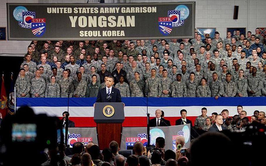 President Barack Obama talks about the emergence of South Korea and the continued despair of the North during a visit with soldiers and family members at Collier Field House, at U.S. Army Garrison-Yongsan in Seoul, on Nov. 11, 2010.