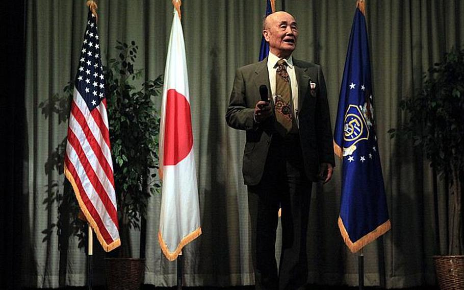 Hamaki Tanaka,the attorney adviser for the Office of the Staff Judge Advocate 5th Air Force, says his farewells after 59 years of service to the U.S. government during his retirement ceremony Friday.