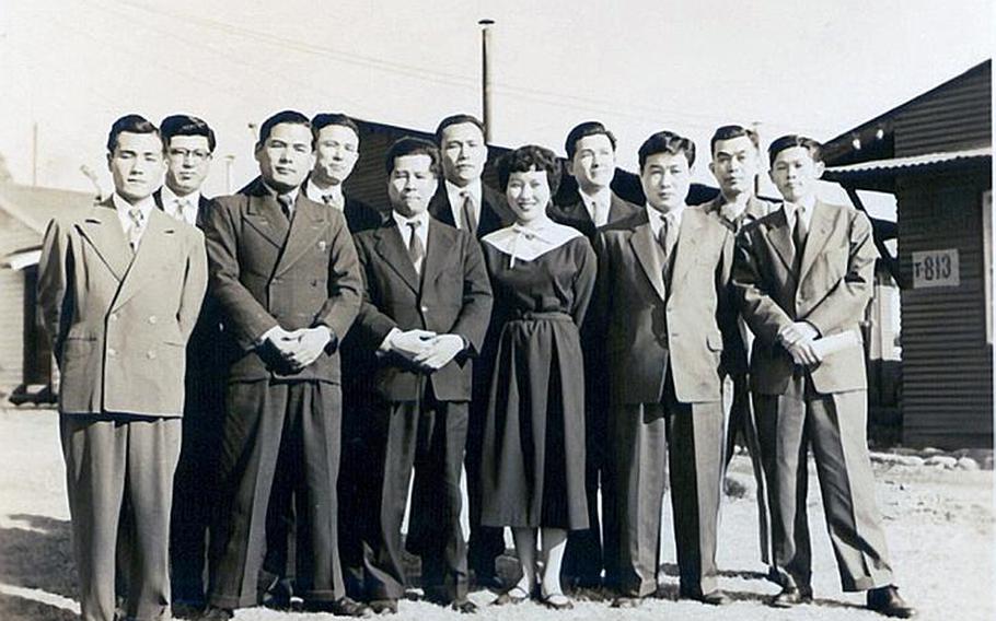 Hamaki Tanaka, far left in front row, is pictured here at the Central Civilian Personnel Office at Yokota Air Base, Japan, in 1957. Tanaka is retiring as the attorney adviser for the Office of the Staff Judge Advocate 5th Air Force after 59 years of service to the U.S. government.