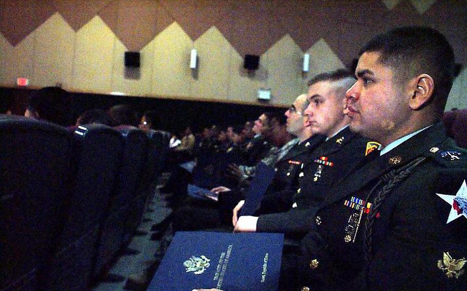 Thirty-eight soldiers are swore in as U.S. citizens during the naturalization ceremony Wednesday at Yongsan Garrison, South Korea.