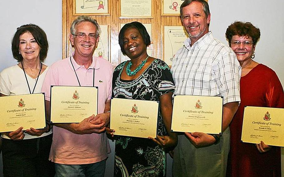 These five Department of Defense Education Activity teachers are currently in Afghanistan, helping teach English to Afghan security forces. From left: Judy Ryan, Steve Osborne, Pamela Tucker, Thomas Wiglesworth and Brenda Colom.