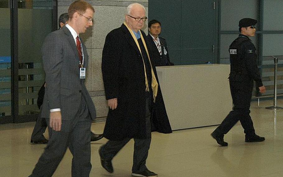 U.S. Ambassador Stephen Bosworth, special representative for North Korea policy, center, arrives Tuesday at South Korea's Incheon International Airport. Bosworth is on a four-day, three-country Asian visit focused on what to do about North Korea. Stops in Japan and China are also scheduled.