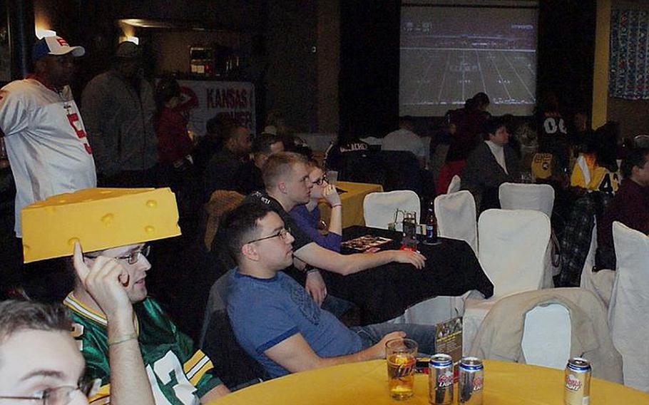 Civilians, servicemembers and their families gather to watch Super Bowl XLV at the Yongsan Main Post Club on Monday.