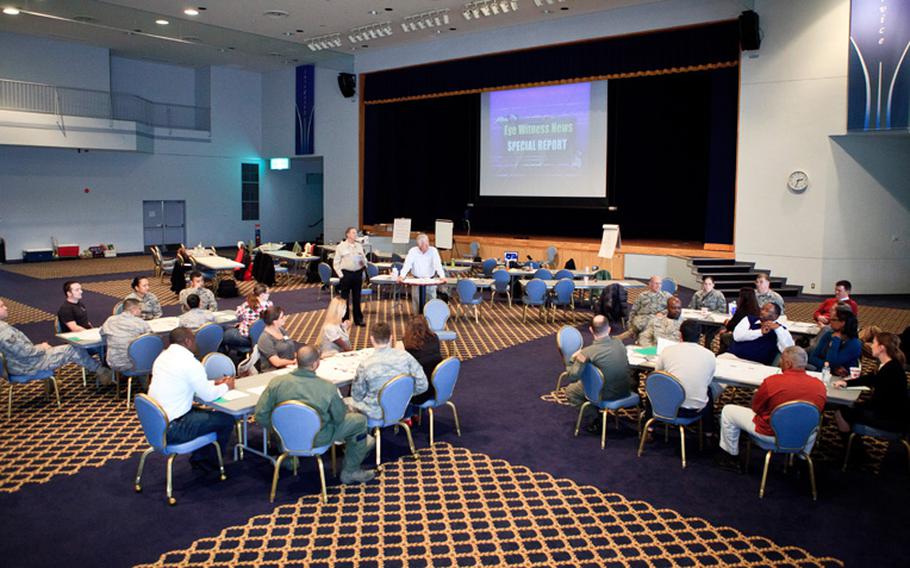 Military and civilian volunteers undergo disaster preparedness training Thursday at Yokota Air Base's Taiyo Community Center.