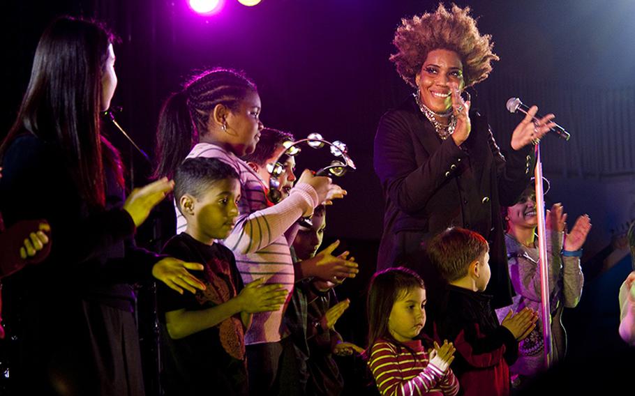 Grammy Award-winning artist Macy Gray invited the children in the audience to sing with her on stage at the end of her free concert at Yokosuka Navy Base, Japan on Feb. 23. Gray is in Japan playing free shows for servicemembers in Okinawa, Yokosuka and Atsugi, along with concerts at Billboard Live in Tokyo.