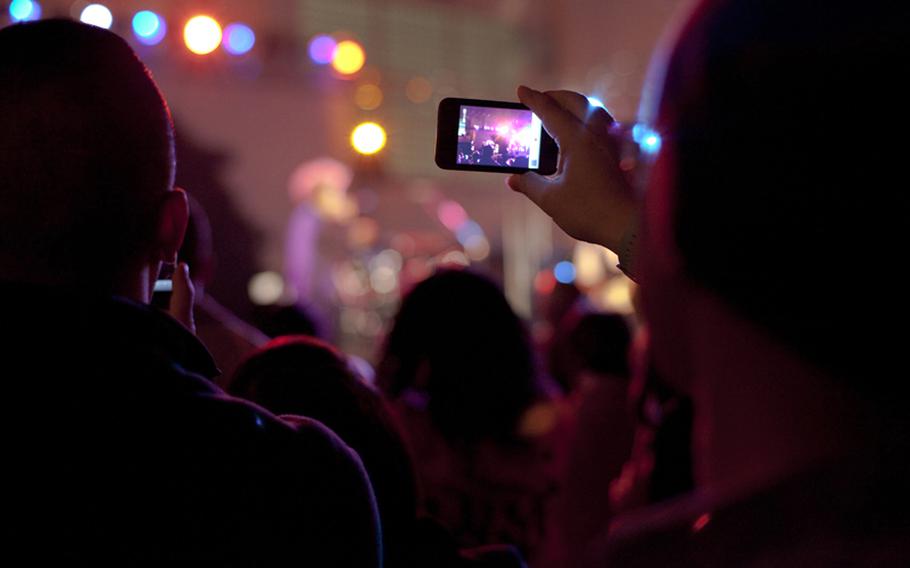 A concert-goer captures the moment during a Macy Gray concert at Yokosuka Naval Base on Feb. 23. 