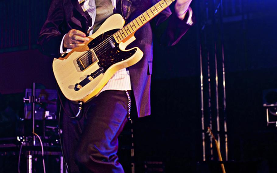 The guitarist for Macy Gray plays during a free concert Yokosuka Naval Base on Feb. 23.