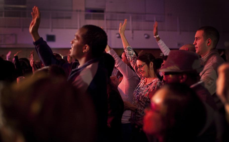 Concert-goers enjoy the song "I Try" during the Macy Gray concert at Yokosuka Naval Base on, Feb. 23.
