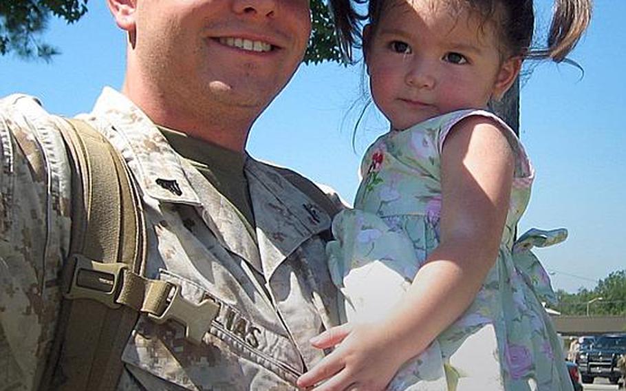 Michael Elias, 26, a former Marine, with daughter Jade, now 5, said his Japanese wife surreptitiously absconded with his children to Japan from their home in Rutherford, N.J., in late 2008.