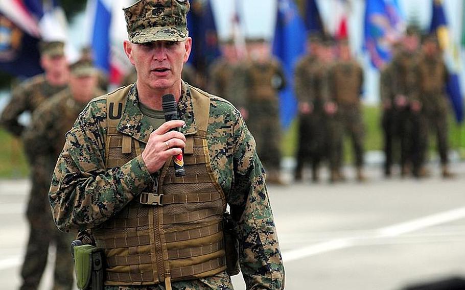 Brig. Gen. Mark A. Brilakis gives some quick comments during the change of command ceremony where he took command of 'The Fightin' Third.' He said he looks forward to the coming months leading the Marines and sailors of 3rd Marine Division.