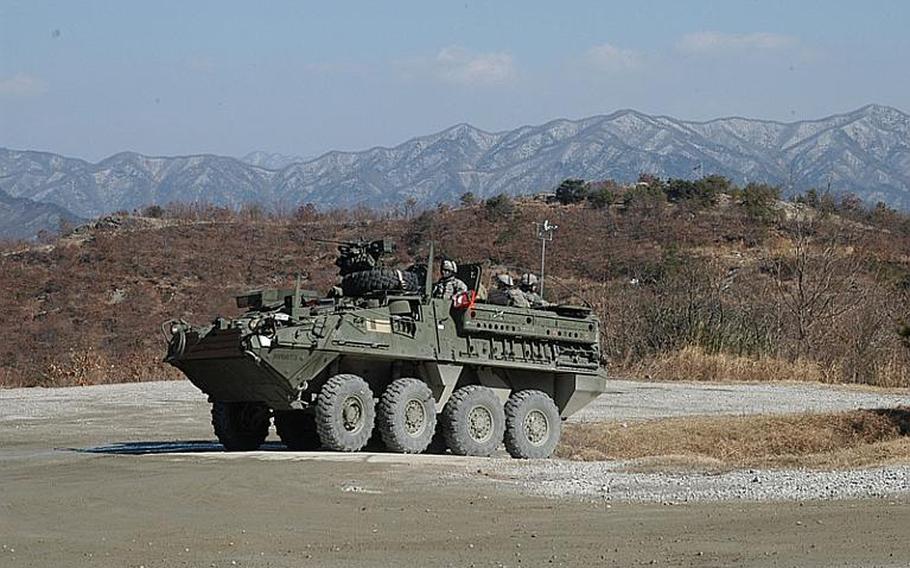 One of four U.S.-based Strykers brought to South Korea for this month's Foal Eagle/Key Resolve exercises rolls into view after a drill Monday near the Demilitarized Zone.