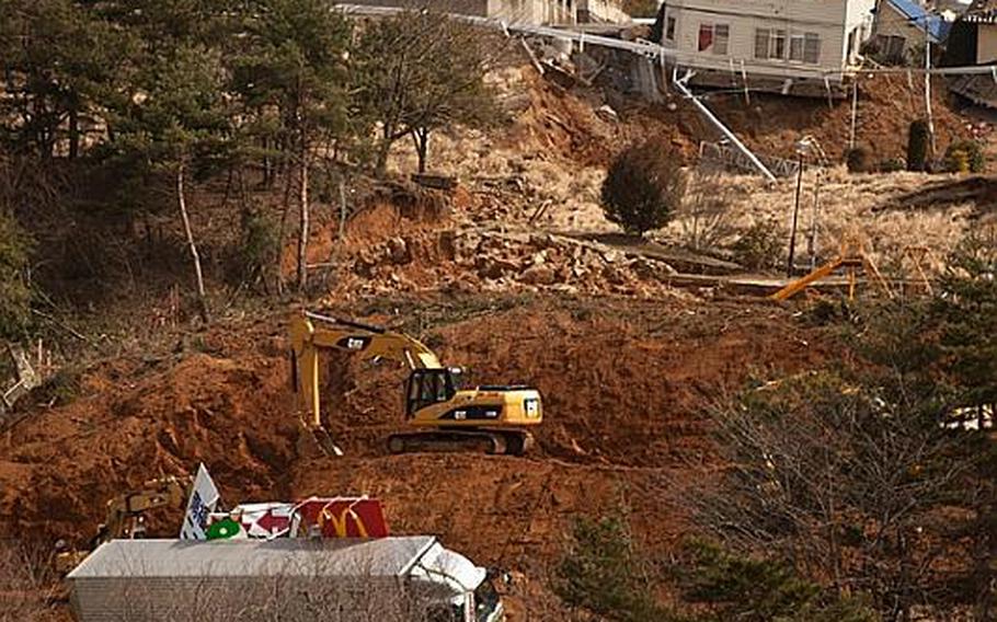 Mudslides blocked part of Route 4 about 40 miles south of Sendai, which was devastated by Friday's earthquake.