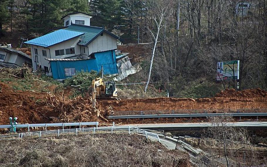 Mudslides blocked part of Route 4 about 40 miles south of Sendai, which was devastated by Friday's earthquake.