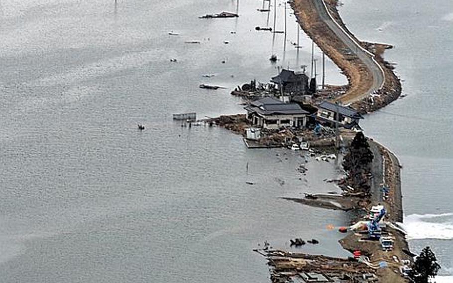 U.S. Navy helicopters, including those belonging to Helicopter Anti-Submarine Squadron 14,  got a bird's-eye view of the coastal area of northeastern Japan as they delivered humanitarian relief to communities like this that were destroyed by a March 11 earthquake and tsunami.