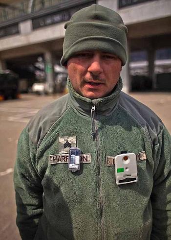 Sgt. James Harrison, 31, with the 35th Combat Sustainment Support Battalion, talks about the two dosimeters the Army and Air Force require him to wear at the temporary U.S. military camp set up at Sendai Airport in Sendai, Japan.