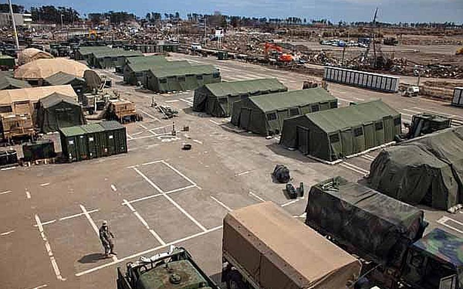 An elevated view of the temporary U.S. military camp set up at the Sendai Airport in Sendai, Japan, that is housing about 200 Marines and soldiers.