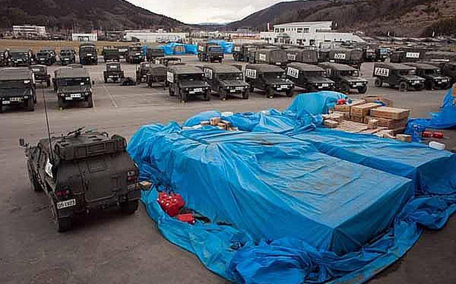 Japan Self-Defense Force vehicles and tents have taken over the Ishinomaki General Sports Park in Ishinomaki, Japan, which has become their base of operations for the area.