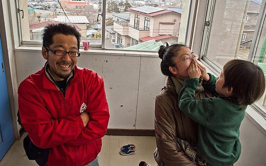 Takeshi Nakagawa, along with his wife, Chikako, and son Sota describe how they survived the March 11 tsunami. They are now staying at the Kadonowaki Middle School in Ishinomaki, Japan. The shelter said all displaced residents staying in the school's classrooms must clear out by the beginning of the new school year on April 21. 