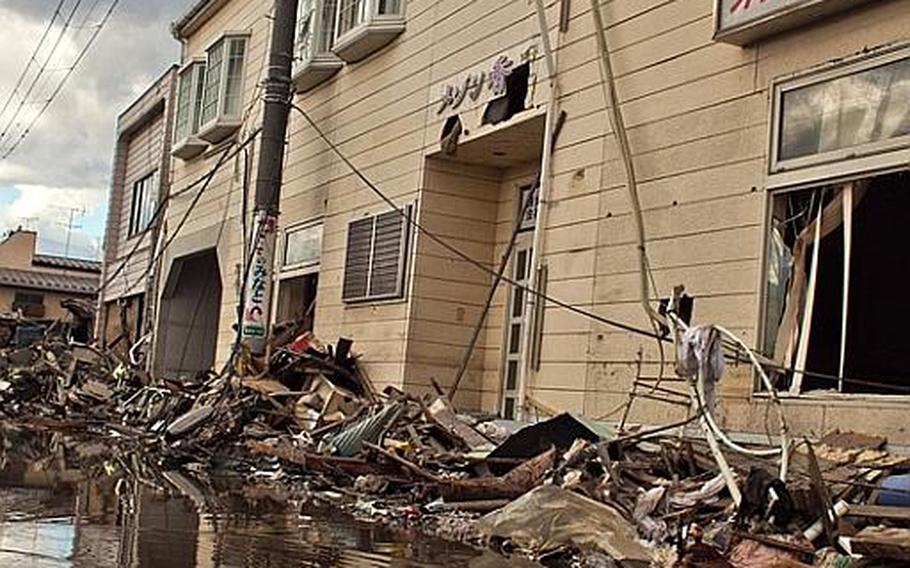 There is still standing water in areas damage by the March 11 tsunami in Ishinomaki, Japan.