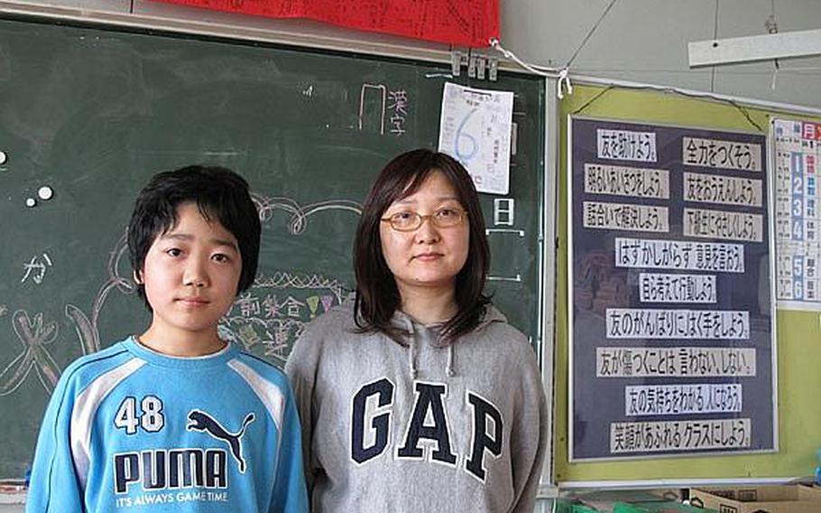 Iori Nametaka, 12, and his mother, Kyoko, live in a classroom with other families at Okaido Elementary School in Ishinomaki, a city ravaged by the March 11 tsunami in northeast Japan. The Nametakas have applied for temporary housing, but there is a long wait. Meanwhile, the school&#39;s educators are trying to teach hundreds of students while making room for the 202 evacuees living on school grounds.