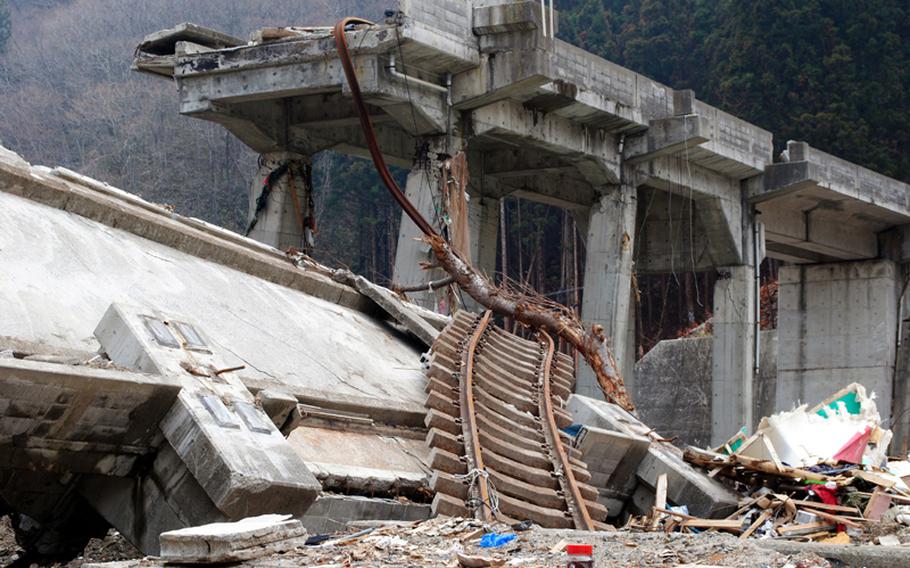 Sections of the elevated train tracks in Tanohata, Japan, were brought crashing down when a gigantic tsunami raced through the coastal fishing village on March 11. Tanohata will be the site of the last major clean-up effort for volunteers from Misawa Air Base, Japan. 