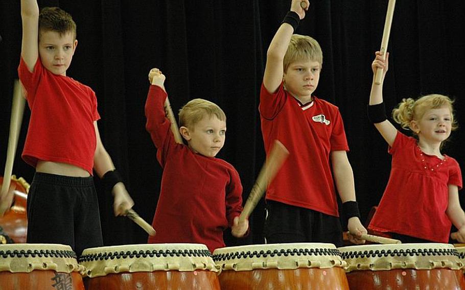 The youngest members of the Dragon-Eagle Taiko drum team perform Saturday at Misawa Air Base, Japan. The team celebrated its 12th anniversary with the performance to raise money for earthquake and tsunami-stricken Japan.