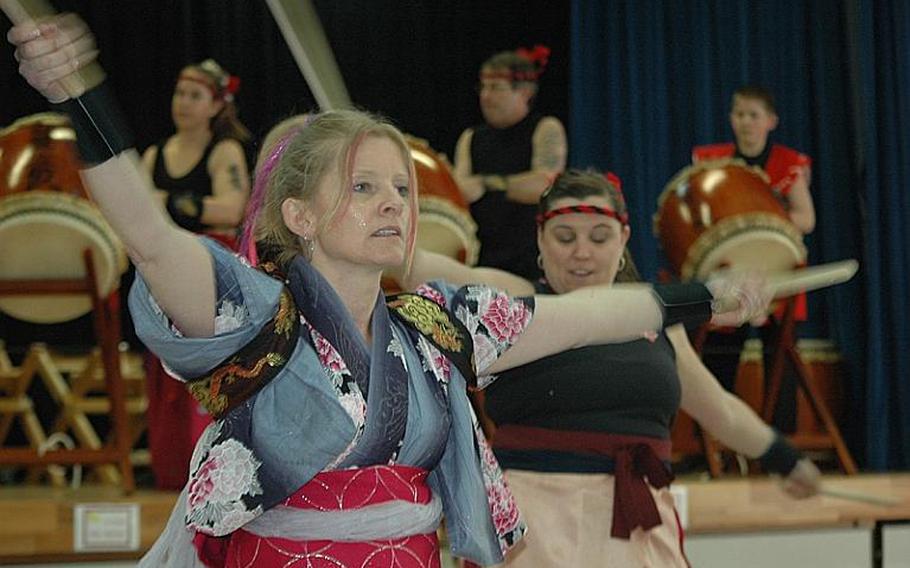 Amanda Turnbow, a member of the Dragon-Eagle Taiko drum team, performs during a concert Saturday at Misawa Air Base, Japan. Turnbow said it?s her last performance with the team because she?s getting ready to leave Japan.