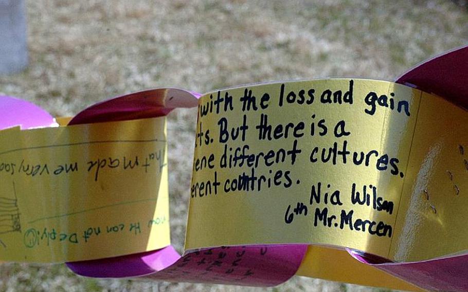 Messages describing what it's like to live the life of a military child -- created by Cummings Elementary School students -- were laminated and linked together to form a long chain that was displayed during a ceremony on Misawa Air Base, Japan, on Friday.