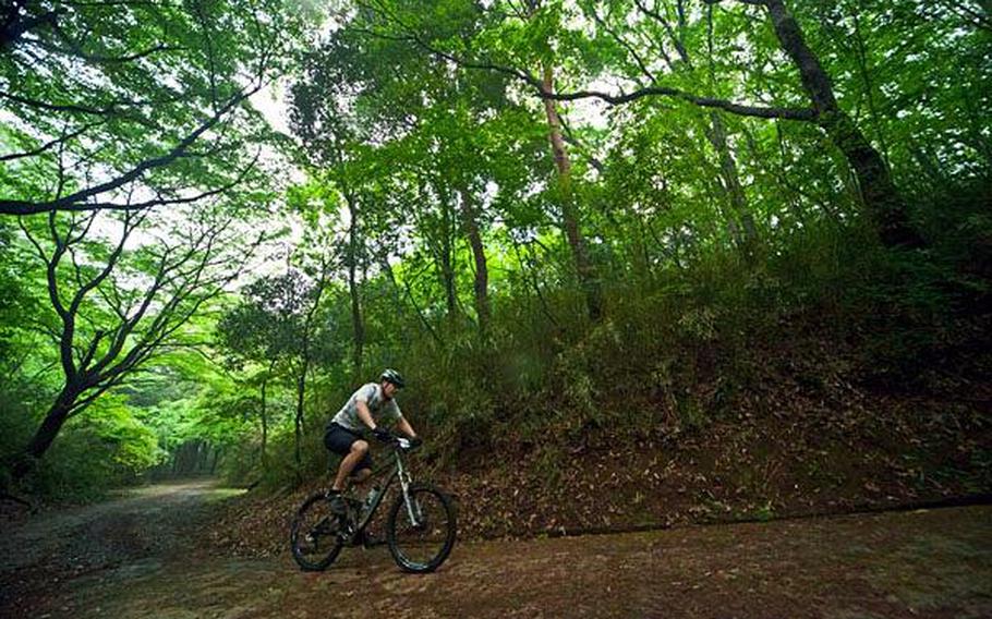 A competitor makes his way through the wet course of the Tour de Tama Saturday at Tama Hills Recreation Center.