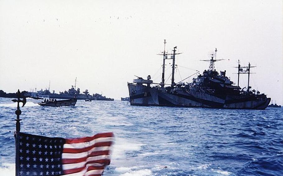 The vessel in the foreground on the right is the command ship of U.S. landing forces during the Battle of Okinawa in 1945.