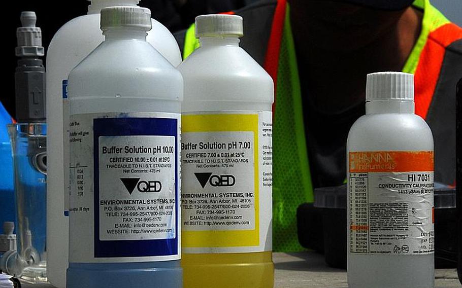 On display are bottles of solutions that were to be used in collecting water samples for testing last week at Camp Carroll, following allegations that Agent Orange was buried there in 1978. A number of local governments in South Korea are or plan to test groundwater around active U.S. bases for possible chemical contamination.