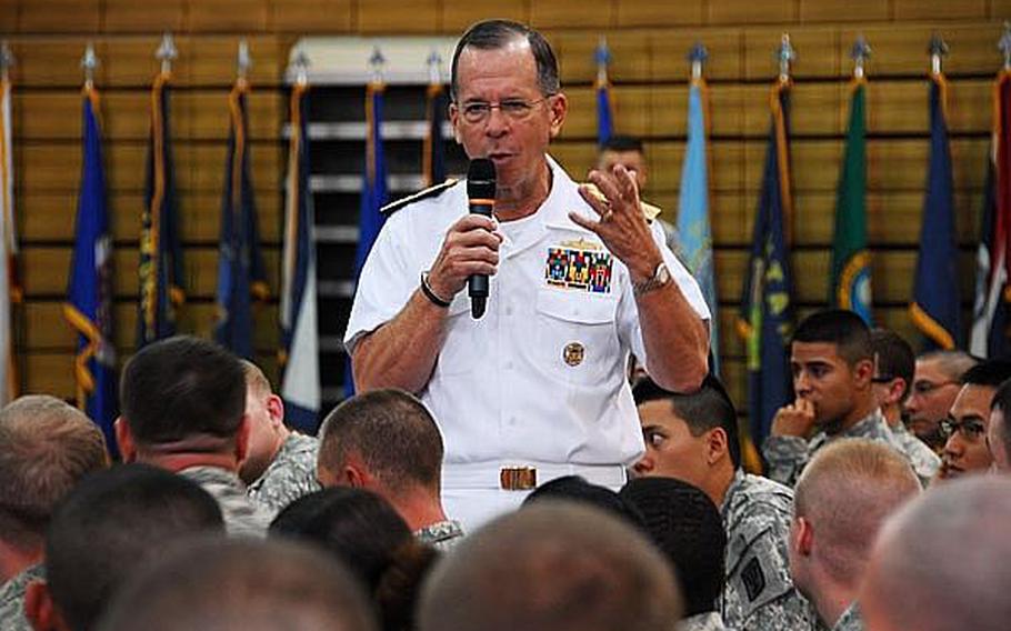 Adm. Mike Mullen, chairman of the Joint Chiefs of Staff, speaks to troops at U.S. Army Garrison-Yongsan on Thursday. Mullen told troops and reporters that future attacks by North Korea remain possible.