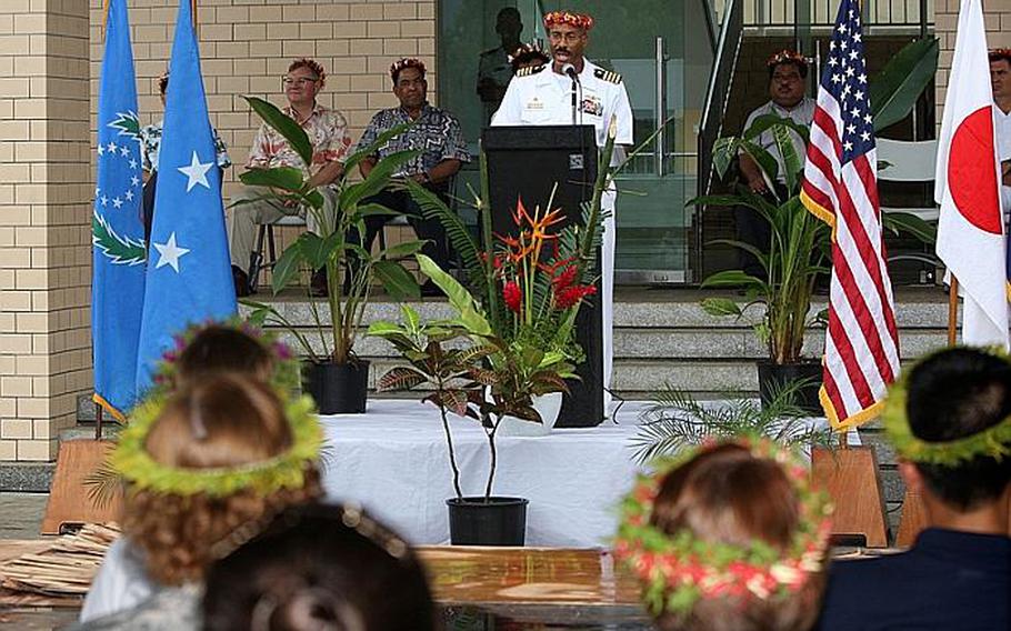 Capt. Jesse A Wilson, mission commander of Pacific Partnership 2011 and commander of Destroyer Squadron 23, speaks during the closing ceremony for the Micronesian phase of Pacific Partnership 2011. Pacific Partnership is a five-month humanitarian assistance initiative that will make port visits to Tonga, Vanuatu, Papua New Guinea, Timor-Leste and the Federated States of Micronesia.