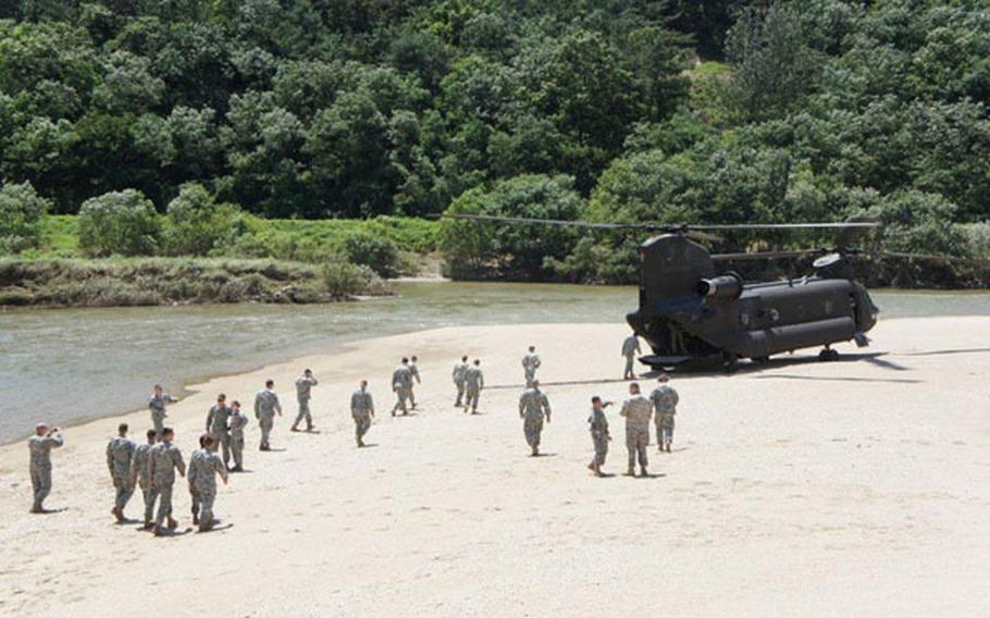 Thirteen cadets tour a beach in South Korea on Tuesday as part of a Cadet Troop Leadership Training program that allows the cadets to attach to U.S. Army units to help them choose what type of field they want to serve in after they finish ROTC.