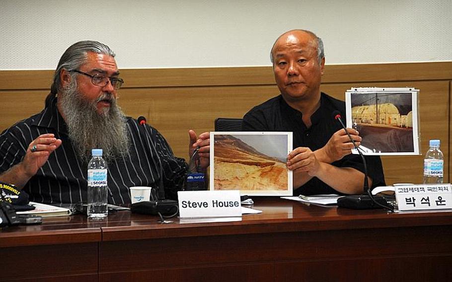 Steve House, a veteran formerly stationed at Camp Carroll, discusses photos he took in 1978 of an area on the base where he says he helped bury barrels of Agent Orange. House testified before members of South Korea&#39;s National Assembly on Monday, along with veteran Phil Steward, who claims troops sprayed the toxic defoliant at bases in the late 1960s.