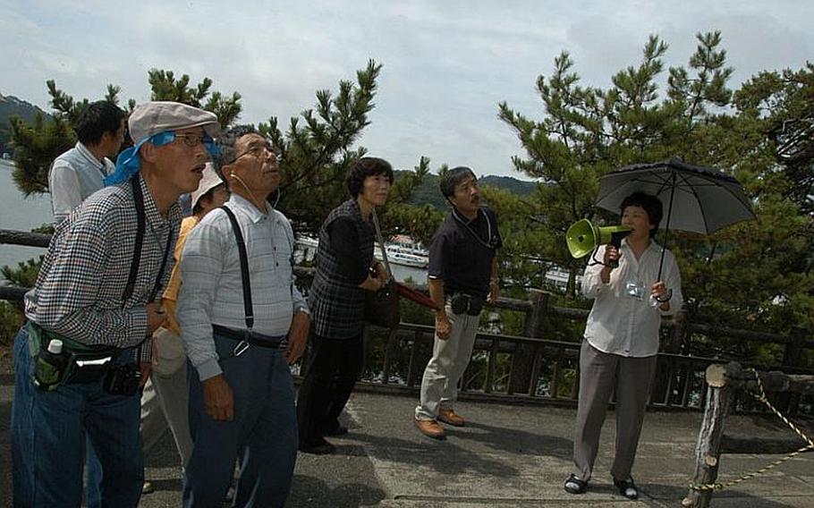 Tourists check out a historic shrine in Matsushima, Japan, on Aug. 24, 2011.