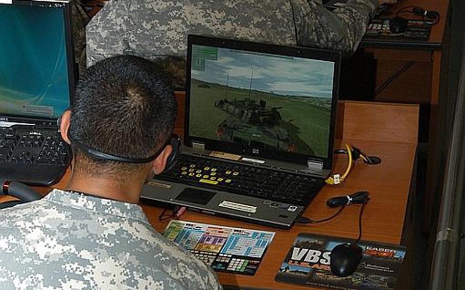 Soldiers with the 2nd Battalion, 9th Infantry Regiment, Delta Company take part in Video Battlespace 2 training in August 2011, at Camp Casey in South Korea.