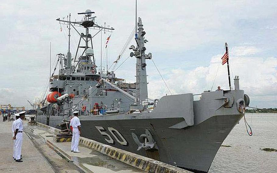 Members of the Bangladesh navy look over USNS Safeguard as it sits moored pierside Sept. 18, 2011, in Chittagong. USNS Safeguard is in country for Cooperation Afloat Readiness and Training (CARAT) Bangladesh 2011. CARAT is a series of bilateral exercises held annually in Southeast Asia to strengthen relationships and enhance force readiness. CARAT Bangladesh 2011 marks the first time the Bangladesh navy has participated in the exercise series.