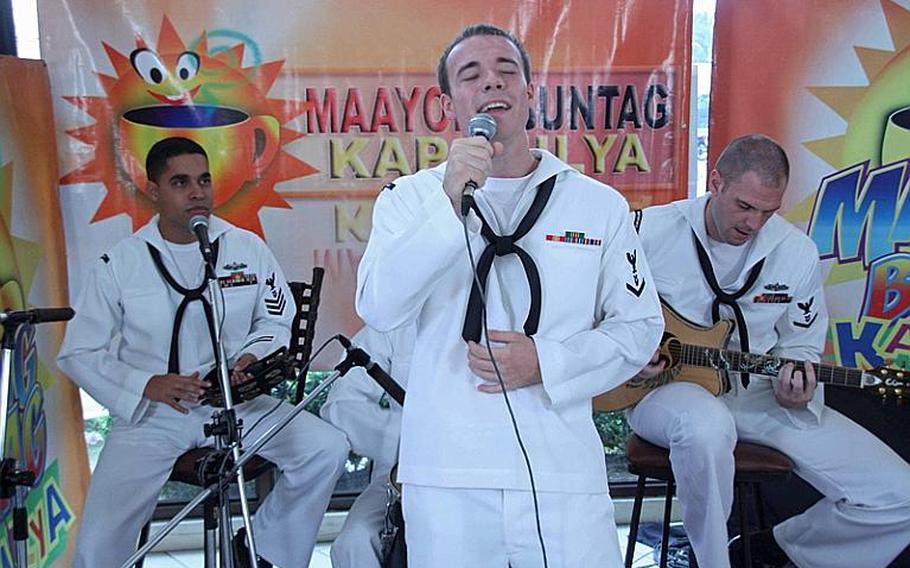 The 7th Fleet Band's Orient Express performs during the ABS-CBN morning television show "Maayong Buntag Kapamilya" Monday in Cebu City, Philippines.  The band is visiting Cebu part of the U.S. Embassy&#39;s program "America In 3D" a program designed to share U.S. culture, values and services in the Philippines.