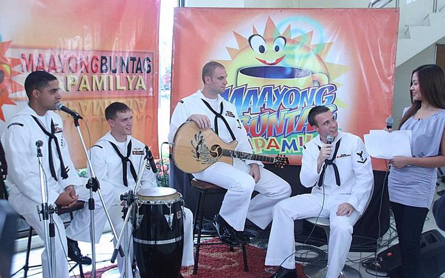The 7th Fleet Band&#39;s Orient Express is interviewed during the ABS-CBN morning television show "Maayong Buntag Kapamilya" Monday in Cebu City, Philippines.  The band is visiting Cebu part of the U.S. Embassy&#39;s program "America In 3D" a program designed to share U.S. culture, values and services in the Philippines.
