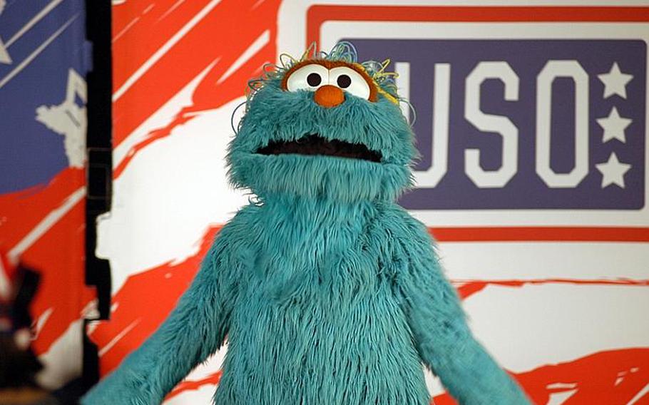 The Sesame Street characters sang and danced for the better part of an hour about the difficulties of military life as a part of the Sesame Street/USO Experience for Military Families show Oct. 6, 2011, at Sasebo Naval Base, Japan.